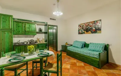 Area soggiorno di Awesome Apartment In Orosei With Wifi