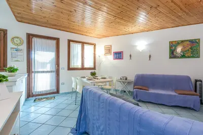 Area soggiorno di Blue&Green House With Shared Pool - Happy Rentals