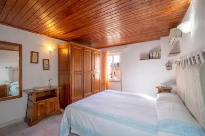 Letto o letti in una camera di Le Case di Mara - Monte Petrosu House