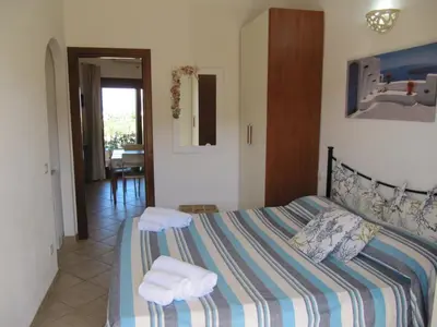 Letto o letti in una camera di Bilocale Vista Mare Le Residenze