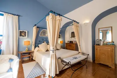 Letto o letti in una camera di Su Gologone Experience Hotel