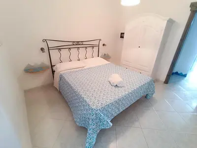 Letto o letti in una camera di Orosei RE - Villa Aurora Rimedia a 50 metri dal mare