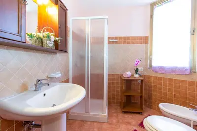 Bagno di Appartamenti in Villa con ampio giardino esterno