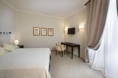 Letto o letti in una camera di Hotel Villa Margherita