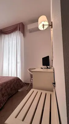 Letto o letti in una camera di Hotel Terranova