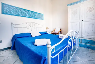 Letto o letti in una camera di Terrazza Lungomare, e sei in spiaggia...