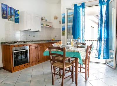 Cucina o angolo cottura di Lungomare Bay, e sei in spiaggia...