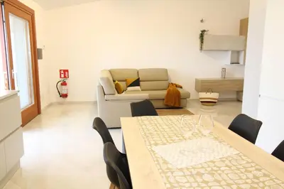 Area soggiorno di la dolce vita -casa vacanze