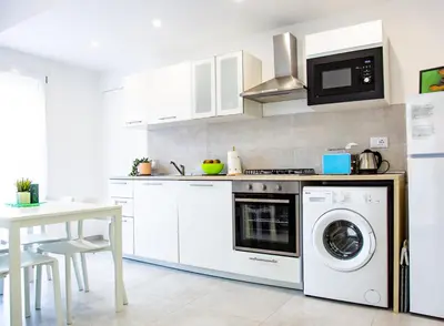 Cucina o angolo cottura di Appartamento Perla Verde, WiFi e Air Con