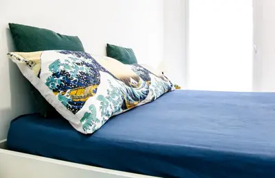 Letto o letti in una camera di Appartamento Perla Verde, WiFi e Air Con