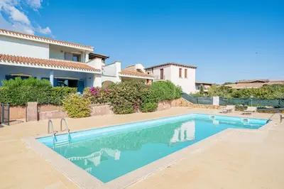 Piscina di Apartments in Residence with swimming pool in Cala Girgolu o nelle vicinanze