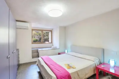 Letto o letti in una camera di Perugina by DomusAway