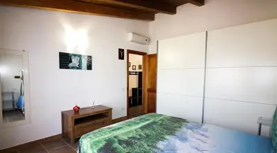 Letto o letti in una camera di Villa Katy