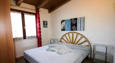 Letto o letti in una camera di Villa Katy