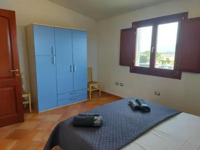 Letto o letti in una camera di villetta Gallura 13