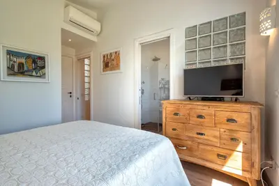 Letto o letti in una camera di Villa Tre Mari - Casa Caterina