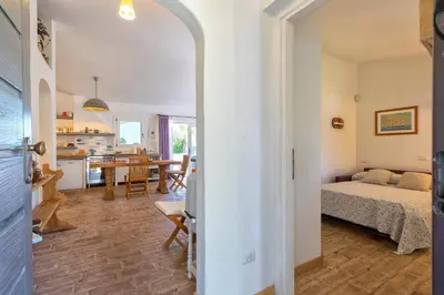 Letto o letti in una camera di Villa Tre Mari - Casa Caterina