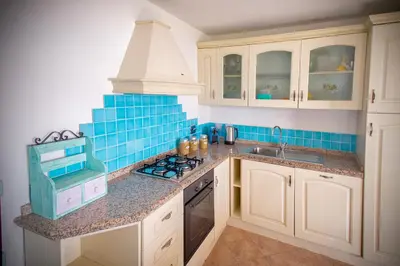 Cucina o angolo cottura di Villa Isuledda Prestige