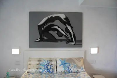 Letto o letti in una camera di SandBeach Apartment