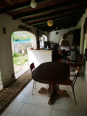 Area soggiorno di Pinnettu sardo tipica abitazione sarda in ecosistema insetti e animaletti simpatici in condivisione bagno esterno a 10metri Leggere attentamente Prima di prenotare