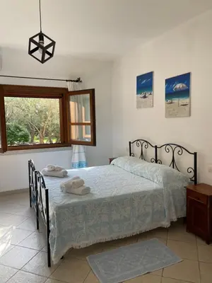 Letto o letti in una camera di Azienda agrituristica contras