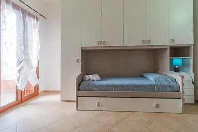 Letto o letti in una camera di Residence La Corte Di Anastasia