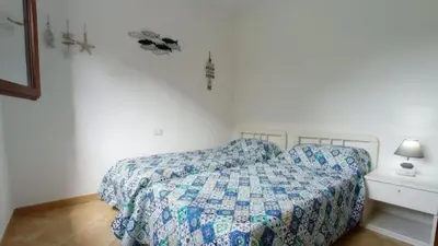 Letto o letti in una camera di Vista Tavolara - Sardegna Holiday Apartment