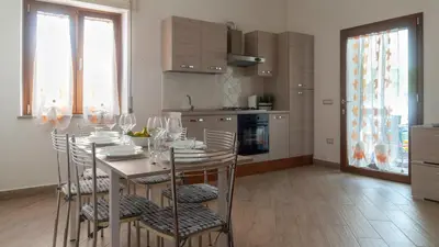 Cucina o angolo cottura di Casa Dei Lecci - Cala Gonone