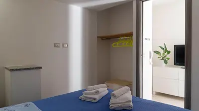 Letto o letti in una camera di Casa Dei Lecci - Cala Gonone