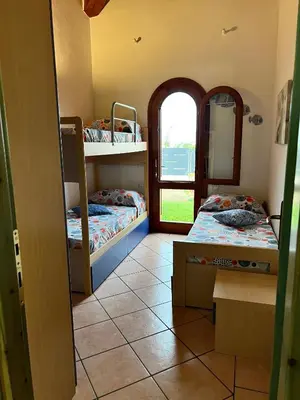 Letto o letti in una camera di Villa Antonella