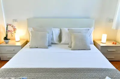 Letto o letti in una camera di Casa Basilia