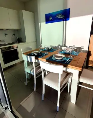 Cucina o angolo cottura di Appartamento Delfino Bianco