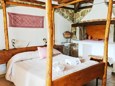 Letto o letti in una camera di Locanda Jannas