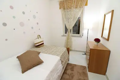 Letto o letti in una camera di Holiday House Camelia 600 meters from the beach