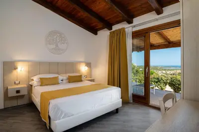 Letto o letti in una camera di Coro e Bentu Rooms & View