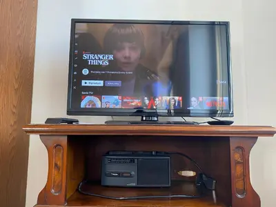 TV o dispositivi per l'intrattenimento presso Dorgali Apartment La Marmora