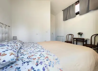 Letto o letti in una camera di Domus Deiana