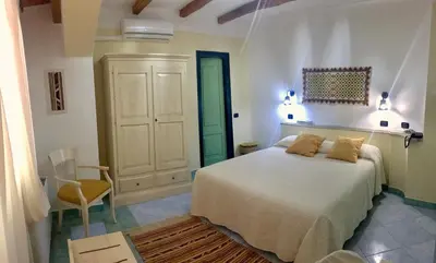 Letto o letti in una camera di Hotel Su Lithu