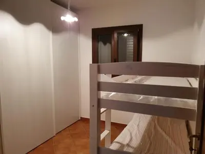 Letto o letti in una camera di Casetta Francy