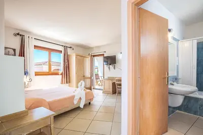 Letto o letti in una camera di Hotel Bonsai
