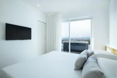 Letto o letti in una camera di Felix Hotels - Hotel Felix Olbia