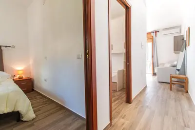 Letto o letti in una camera di Casa Riccio