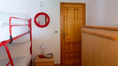 Letto o letti in una camera di Casa dei Lentischi