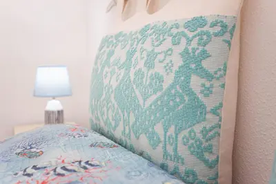 Letto o letti in una camera di Porto Coda Cavallo Beach House a 300 mt dal mare, con terrazza panoramica