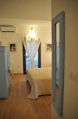 Letto o letti in una camera di LA PAVONCELLA suite
