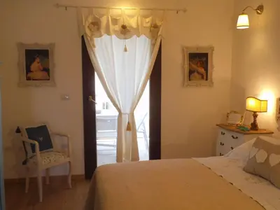 Letto o letti in una camera di LA PAVONCELLA suite