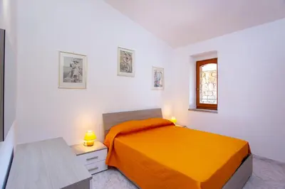 Letto o letti in una camera di Rosa dei Venti