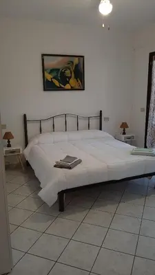 Letto o letti in una camera di PRESSI AEROPORTO COSTA SMERALDA