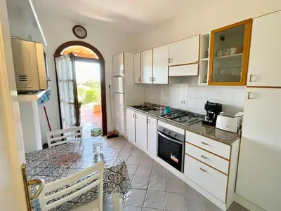 Cucina o angolo cottura di ISS Travel, Panoramic Sea View Ticino - 1 bedroom apartment 1,5 km from the beach