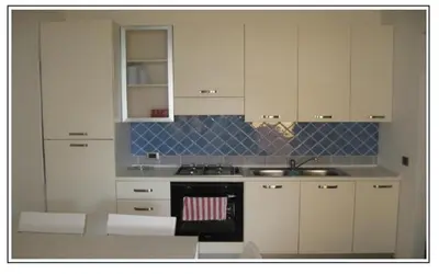 Cucina o angolo cottura di RESIDENZA SARDINIA OROSEI
